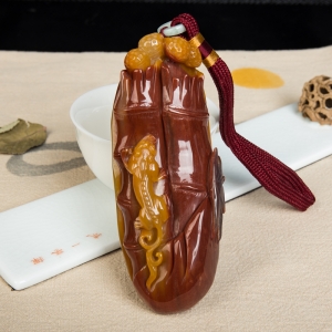 山料俏色黄龙玉节节高升手把件