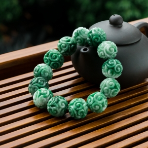 糯冰种深绿翡翠缠枝纹单圈手串