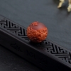 天然俏色南红蝶恋花圆珠-红掌柜